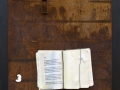 Comunicazione n° 3, 2012, ferro corroso, libro e gesso, 50x70