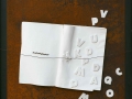Lettere in libertà, ferro corroso, libro, gesso su tavola, 70x50, 2013