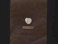 Stele n°4, ferro corroso, sasso su tavola, 175x40, 2000