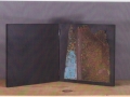 Libro d'artista, 2003, ferro corroso su tavola, 20x20