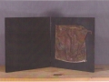 Libro d'artista, 2004, ferro corroso su tavola, 20x20