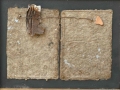 Il dialogo del visibile, ferro, carta a mano, sasso, vetroresina su tavola, 95x41, 2005